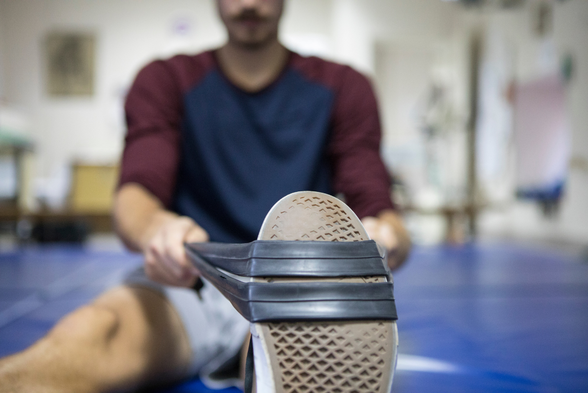 Man Performing Exercises after ACL Surgery 