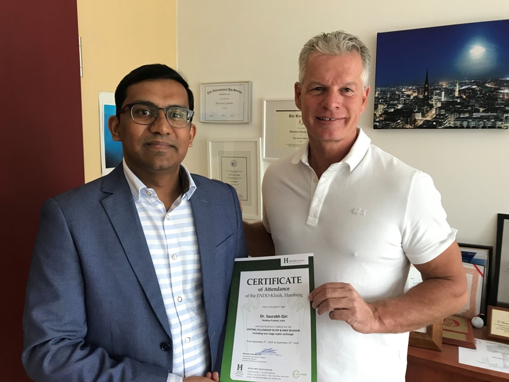 DR. Saurabh Giri receiving Fellowship Certificate from Prof. Dr. Thorsten Gehrke at Helios Endo-Klinik Hamburg, Germany.
